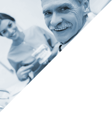 dentist with staff examening paperwork