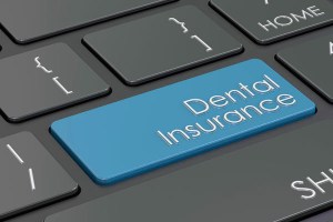 keyboard with a dental insurance key